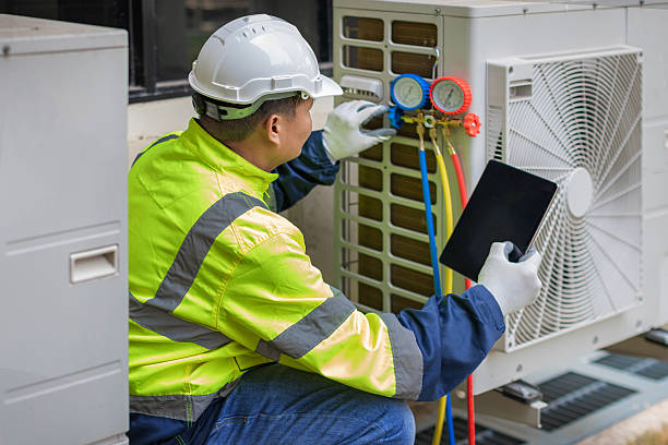 Professional Hvac technician working in Bon Secour, AL